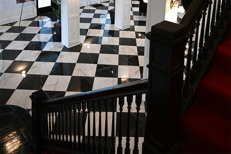 view of lobby of hotel conneaut from stairs