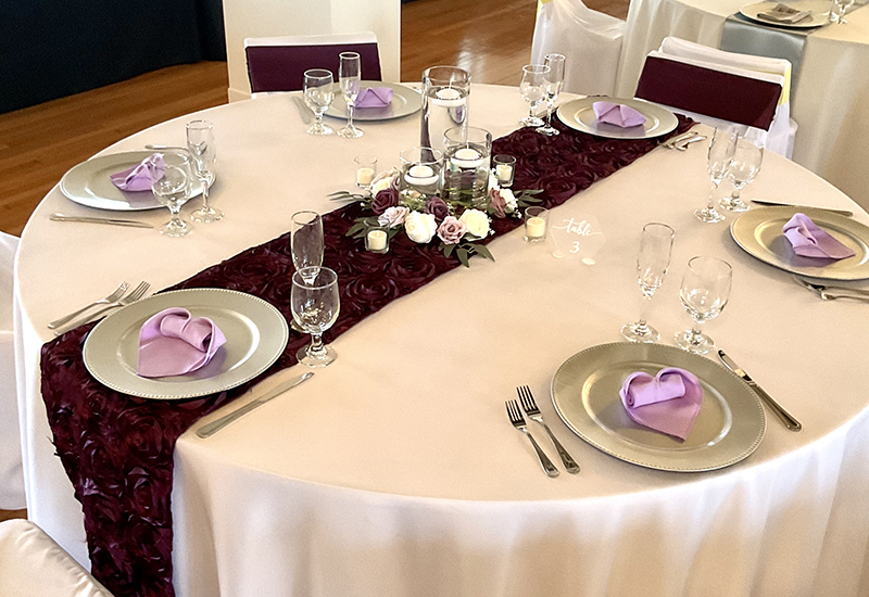 black and lilac table setting at hotel conneaut event - 2024 Bridal Expo 